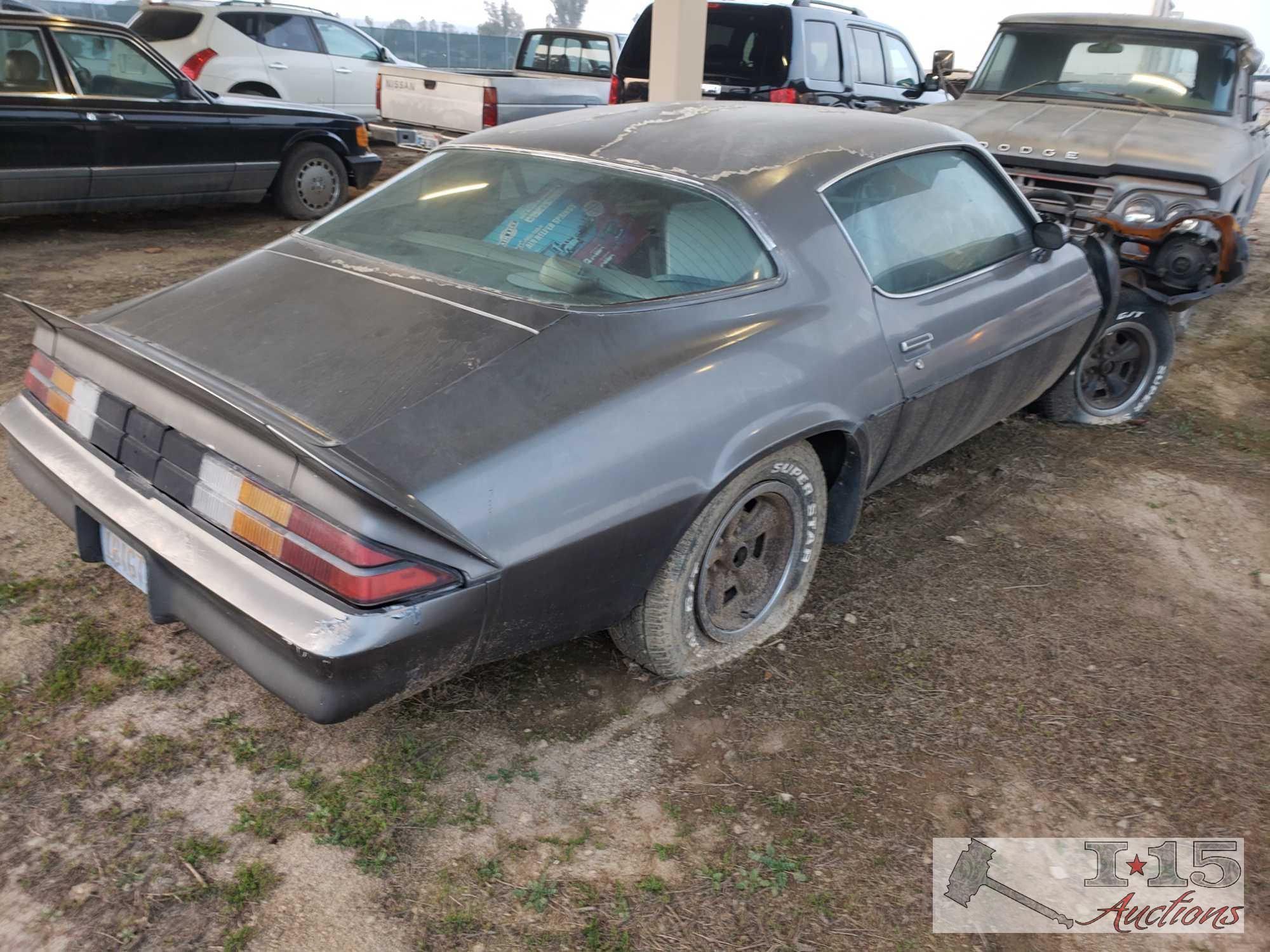 1981 Chevrolet Camaro with miscellaneous parts including hood, fenders, transmission, Front Grill,