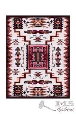 Large Southwest area rug. This rug features a southwestern motif stretching from corner to corner.