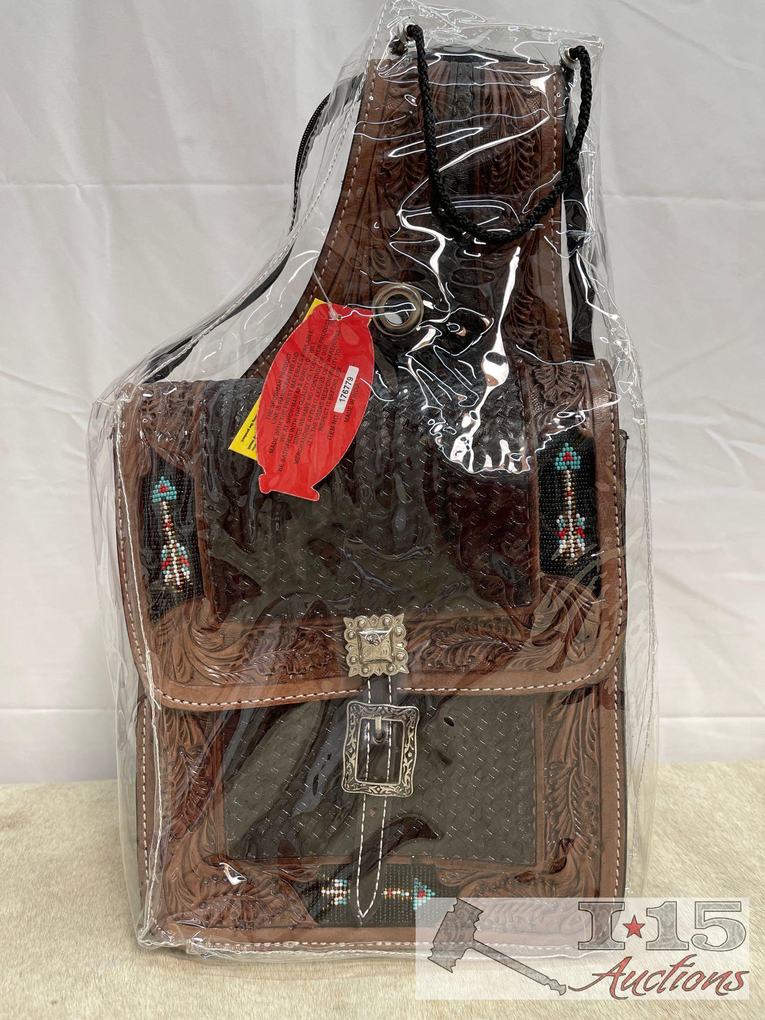 Showman ... Basketweave and leaf tooled leather saddle bag.