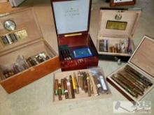 4 Boxes of Approx 74 Cigars, Matches, And Leather Cigar Holder