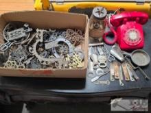 Box of Cast Iron Trivets, (1) Red Rotary Phone, (1) Jar Lantern & More