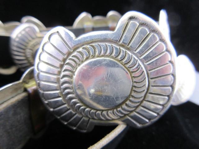 Really nice vintage leather sterling silver Native American conch belt. 100