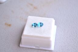 1.74 Carat Matched Pair of Great Oval Cut Electric Blue Topaz