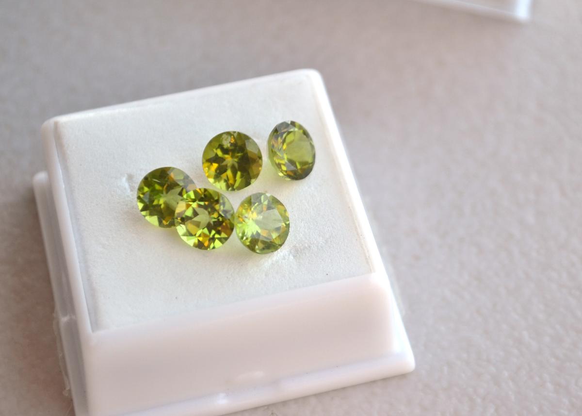 7.09 Carat Matched Set of Round Cut Peridots