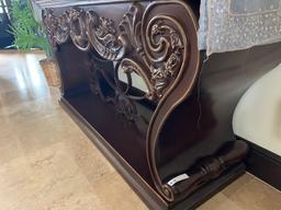 brown wooden cast iron hall table