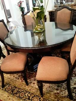 Custom dark wood stain cast iron round dinner table with glass top includes 6 chairs