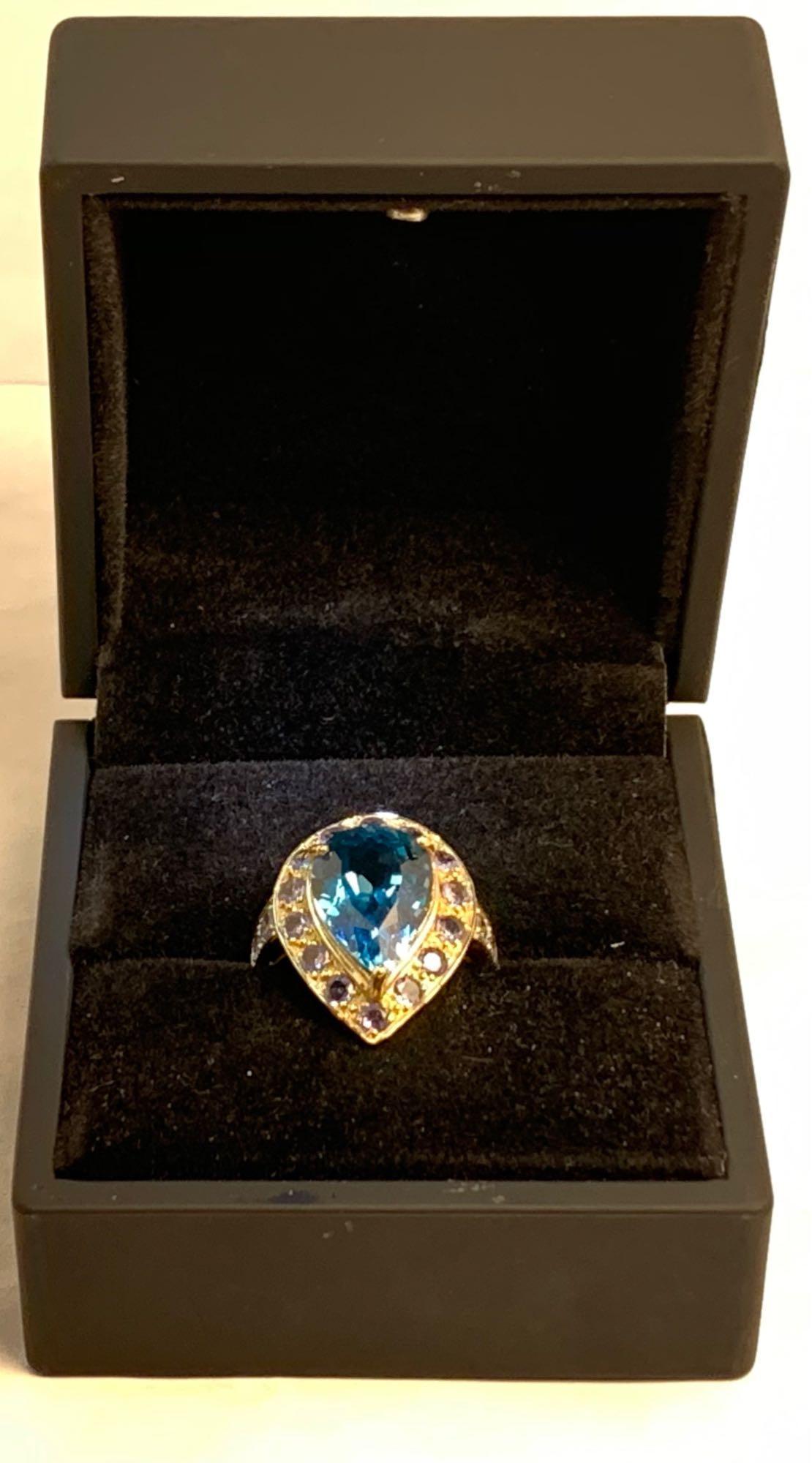 10kt yellow gold ring 6.50 CTW 5.50 blue topaz and 1.00 ct tanzanite