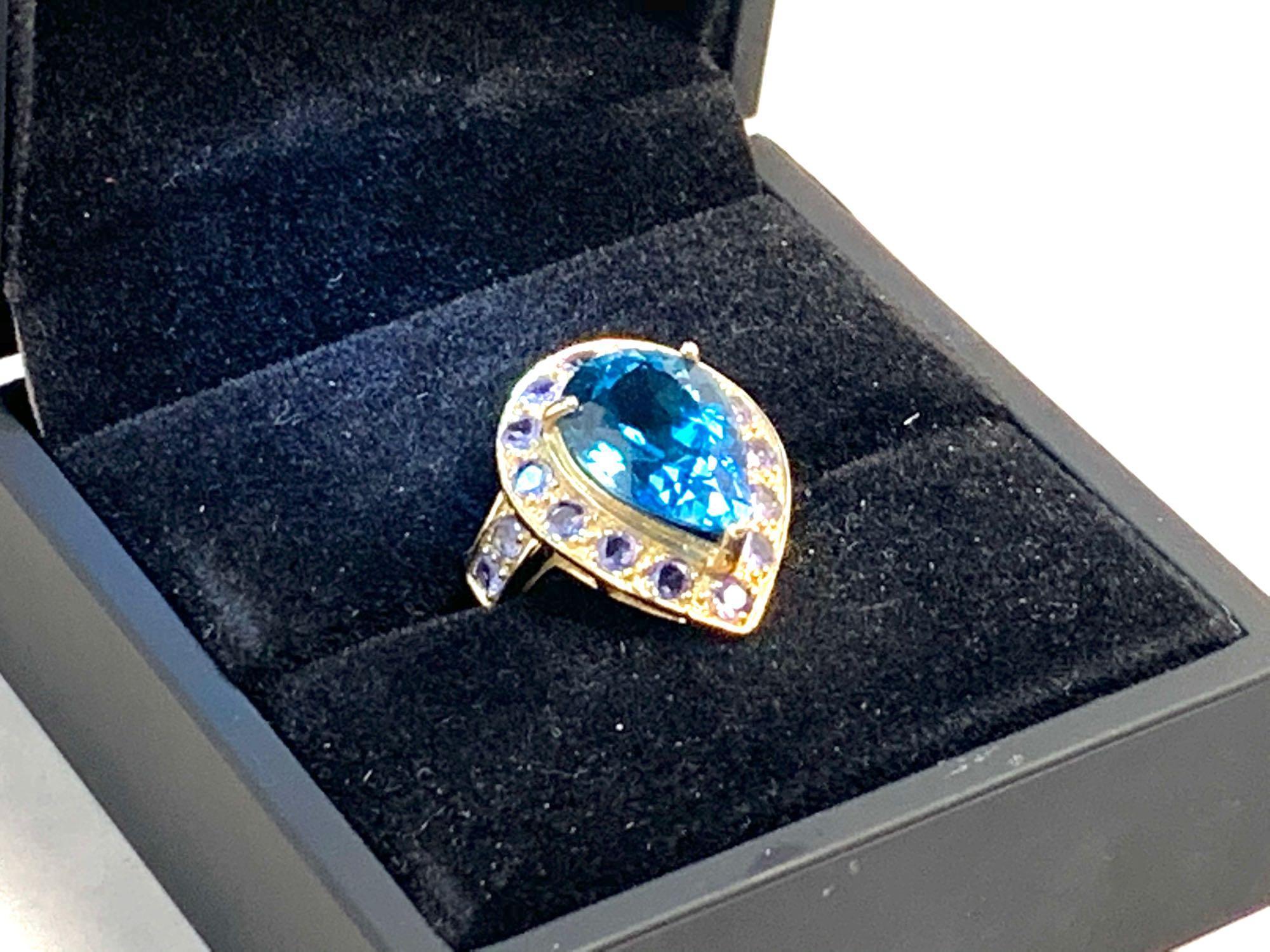 10kt yellow gold ring 6.50 CTW 5.50 blue topaz and 1.00 ct tanzanite