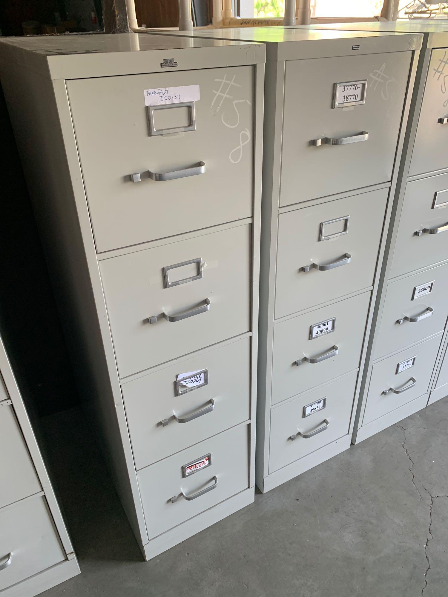 (4) metal filing cabinets