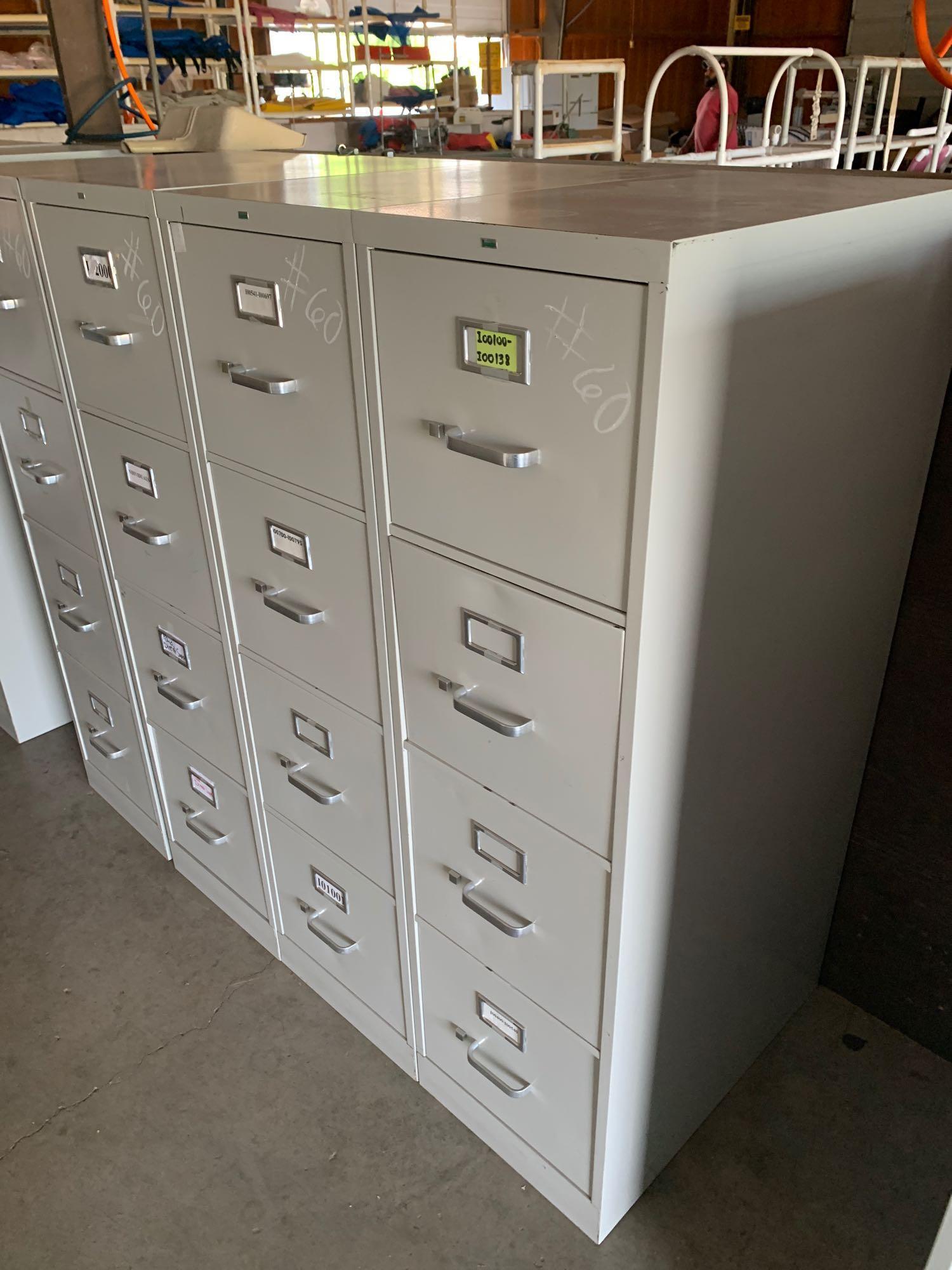 (4) metal filing cabinets