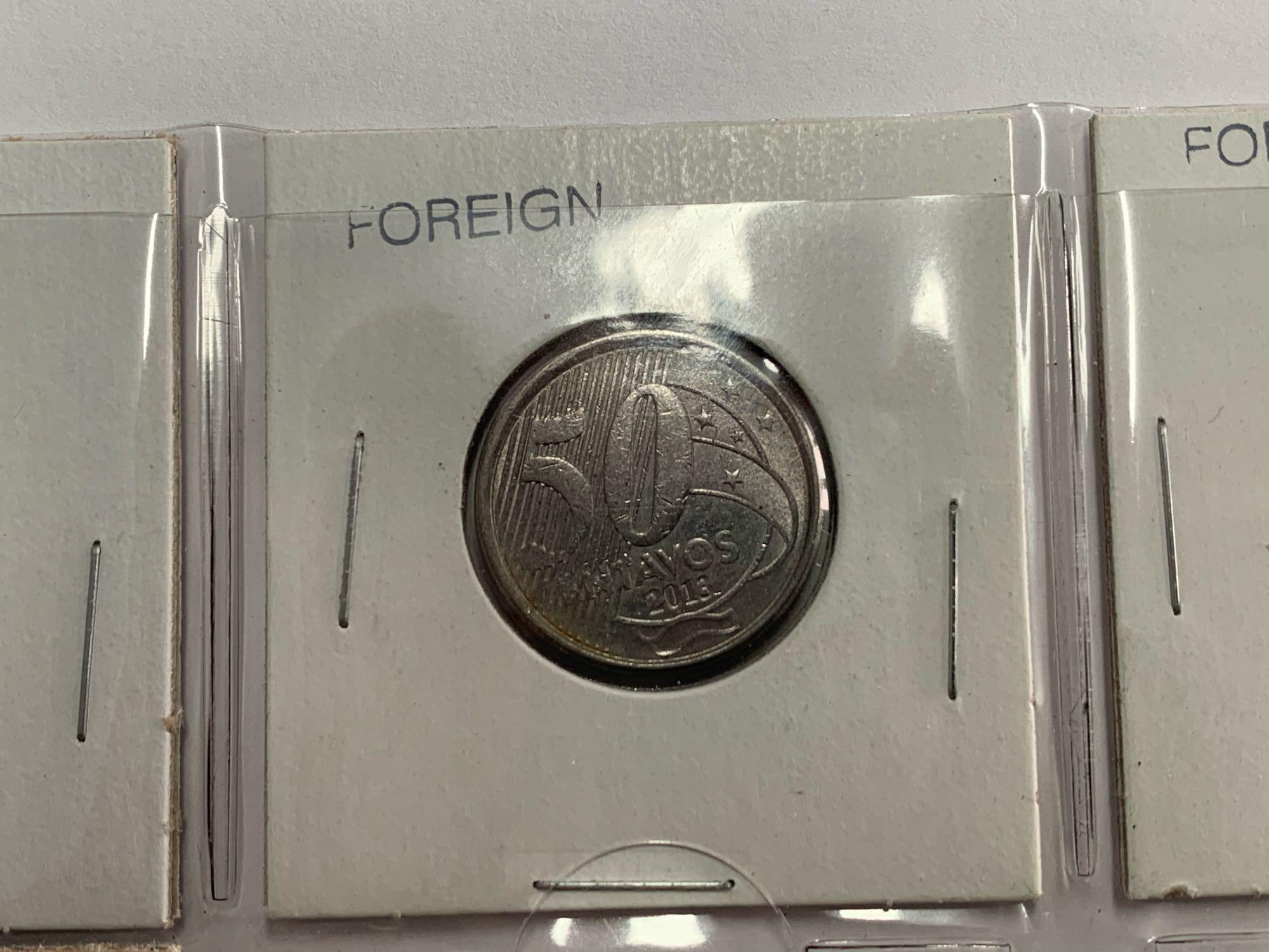 (8) Different Foreign Coins