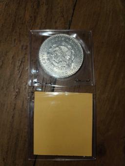 (1) Old Mexican Silver Color Dollar Coin & (1) Kennedy Half Dollar Coin