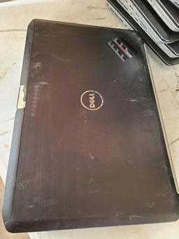 (12) Dell Laptops