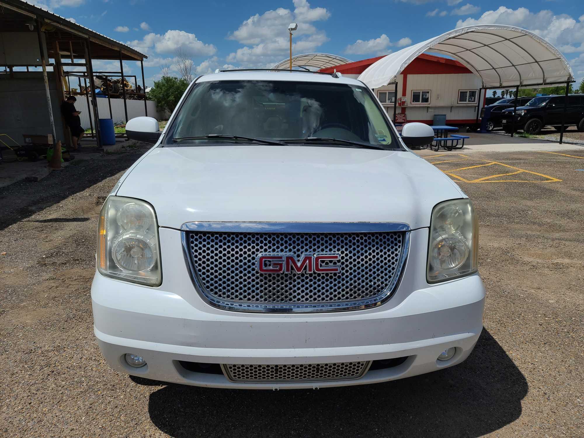 2007 GMC Yukon Multipurpose Vehicle (MPV), VIN # 1GKFK63827J263821