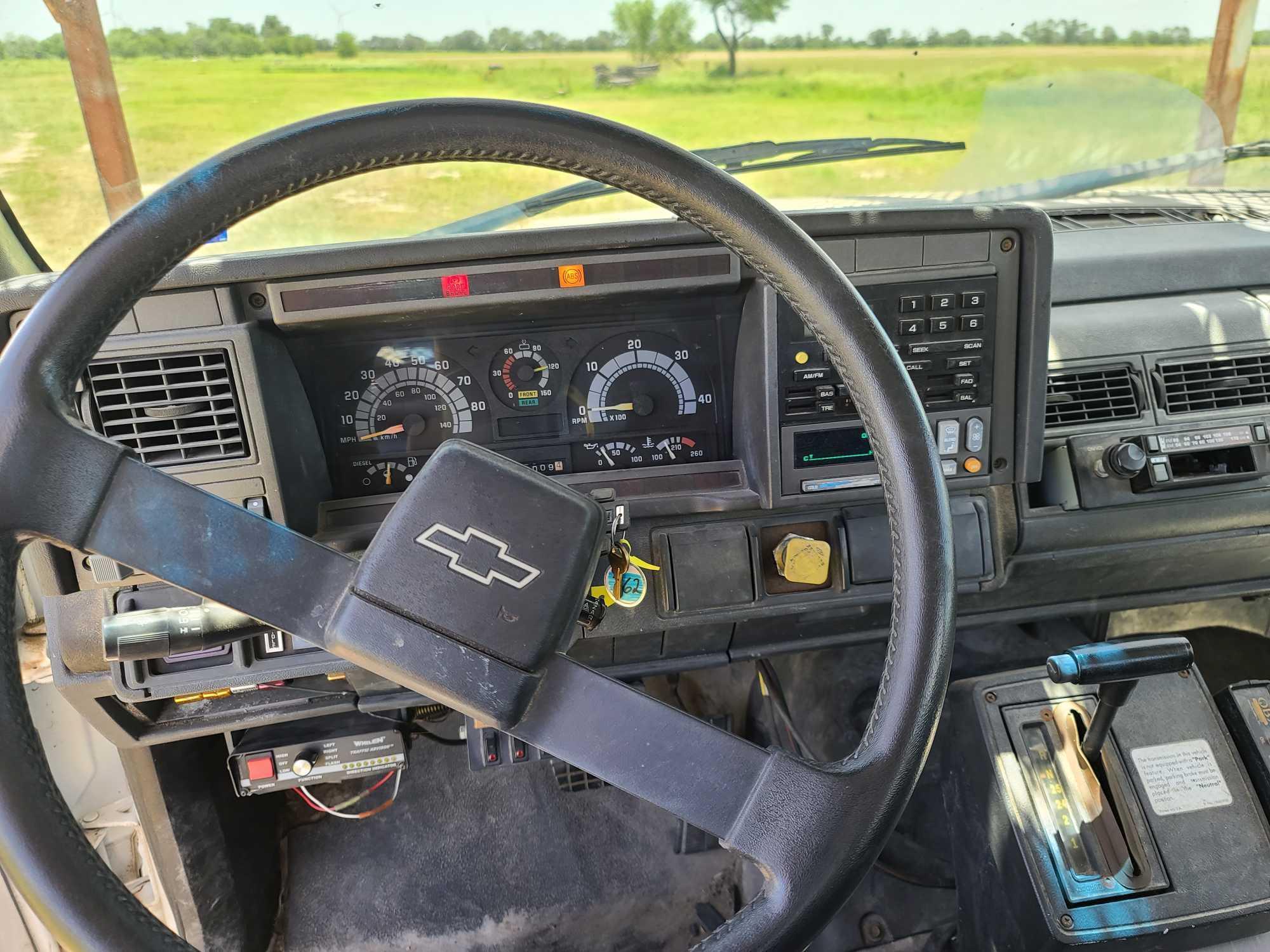 1999 Chevrolet C7500 Bucket Truck, VIN # 1GBP7H1C2XJ100904