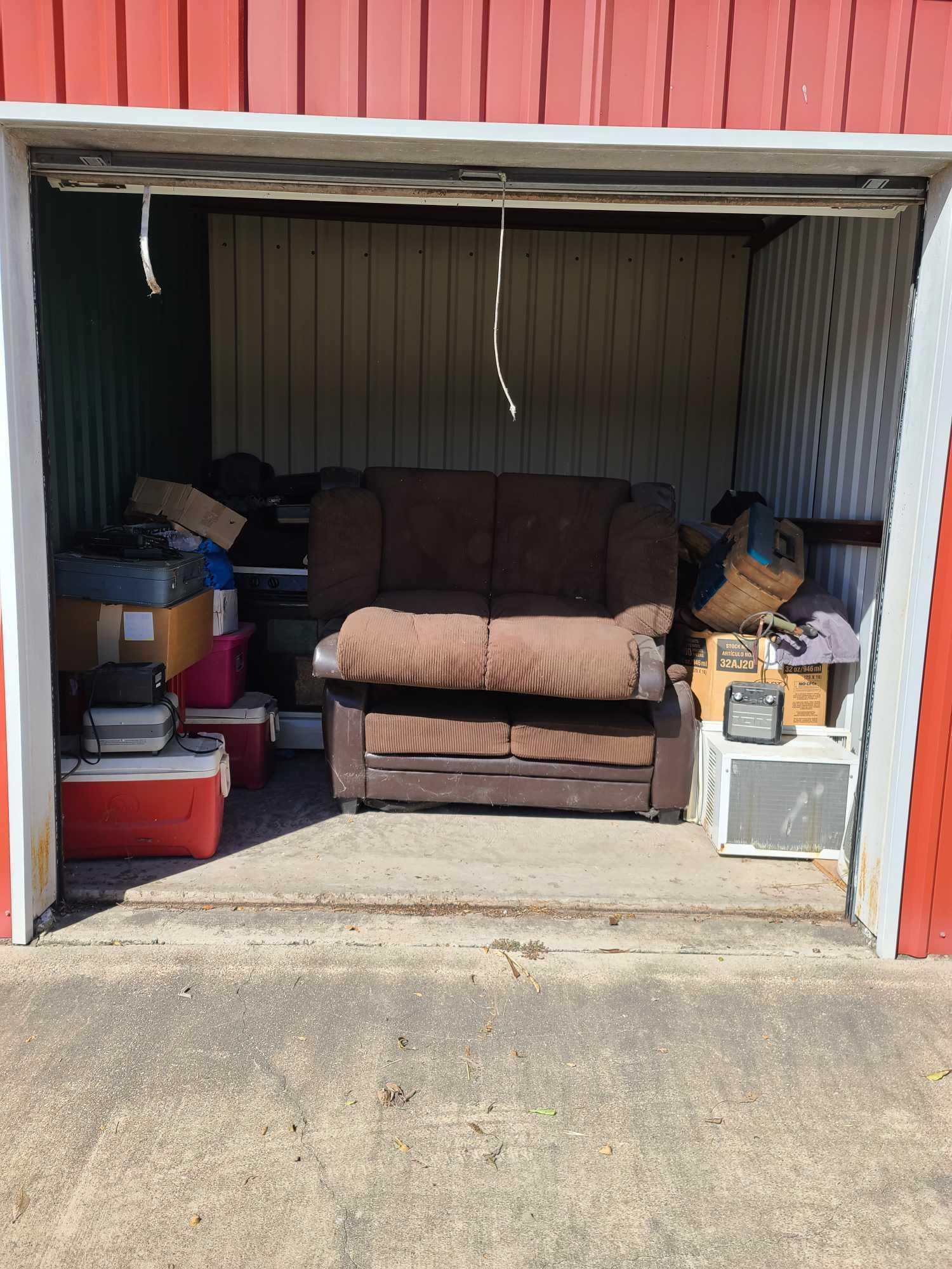 (UNIT # 52) 10x20 Couches, coolers, suitcase, air conditioner, child's car seat, grill