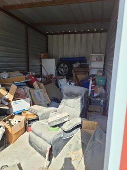 (UNIT # 52) 10x10 Refrigerator, Book Shelves, Tire, Recliner, Misc