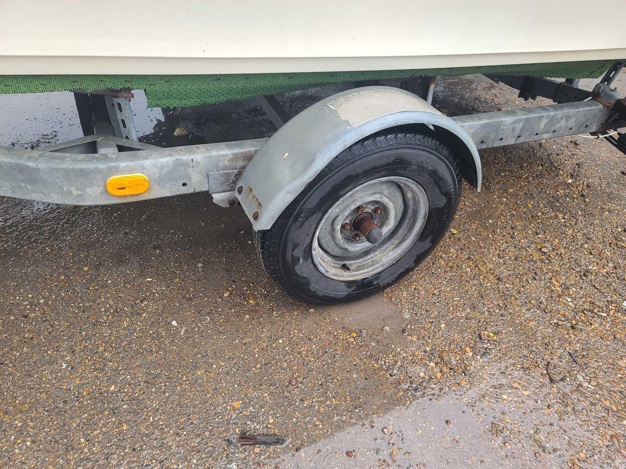 1981 Ranger Boat with a 1981 Johnson Motor & 980 Dill Boat Trailer