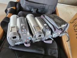 (3) Panasonic Digital Cameras, Group of I/O Magic 22x DVD Drives, Group of Camera Bags