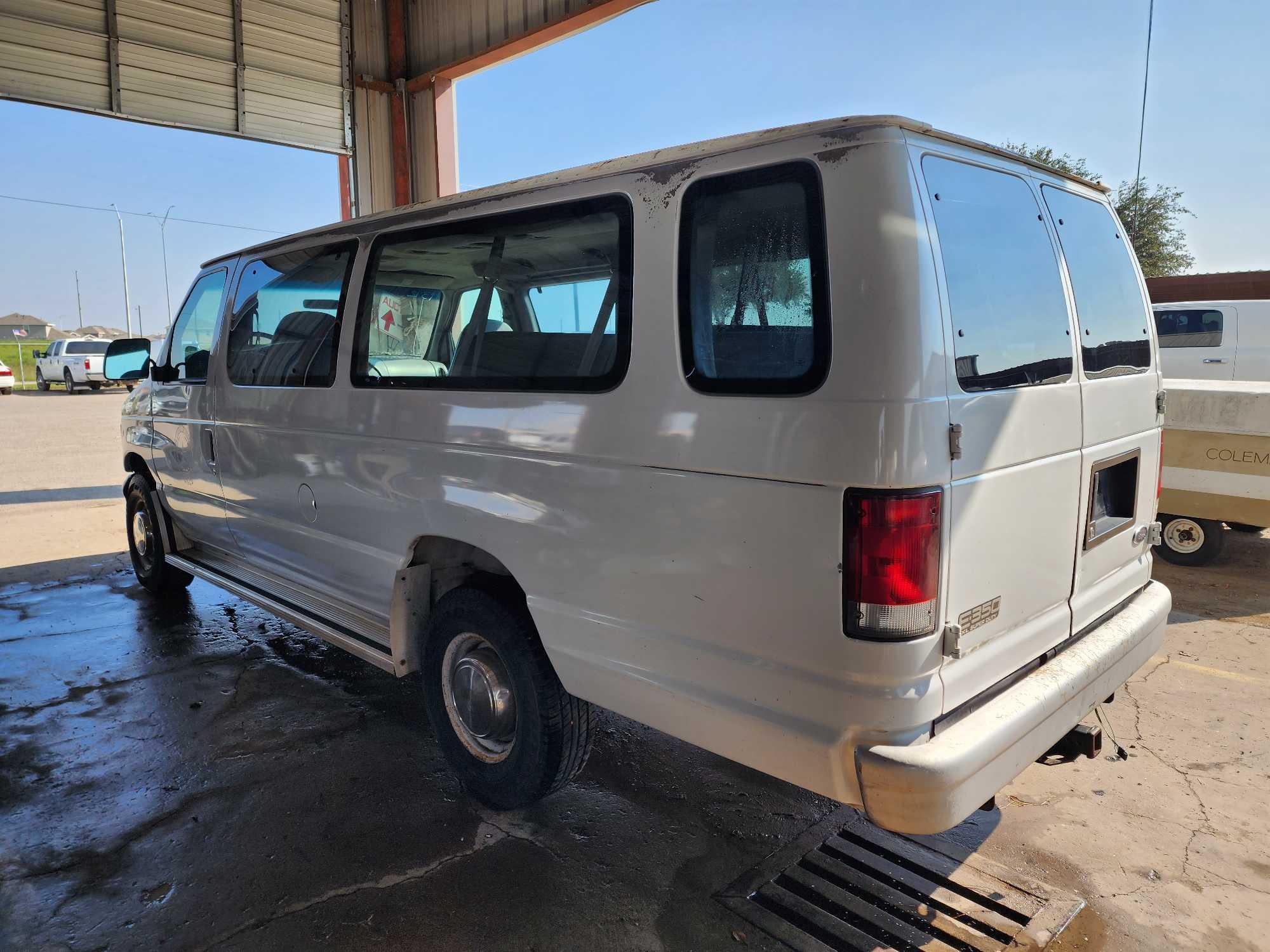 1999 Ford Econoline Wagon Van, VIN # 1FBSS31L9XHB35796