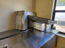 True GDM-49 Two Section Glass Door Merchandiser, Stainless Steel Commercial Cooler