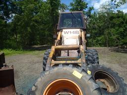 CASE W14B WHL LDR CAB, GRAPPLE FORKS, 16.9R 24 RUBBER S/N OFF ROPS JAB0074882 HRS SHOWING 18020