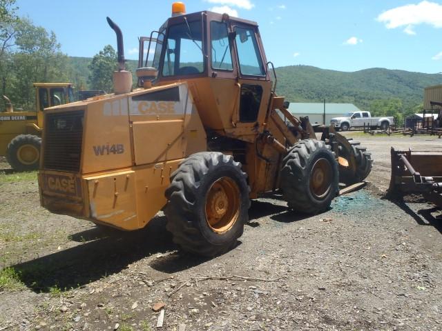 CASE W14B WHL LDR CAB, GRAPPLE FORKS, 16.9R 24 RUBBER S/N OFF ROPS JAB0074882 HRS SHOWING 18020