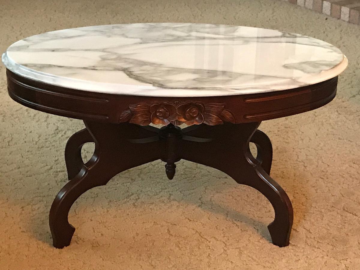 Mahogany Oval Accent Table with Ornate Carvings By Capital Furniture Mfg.