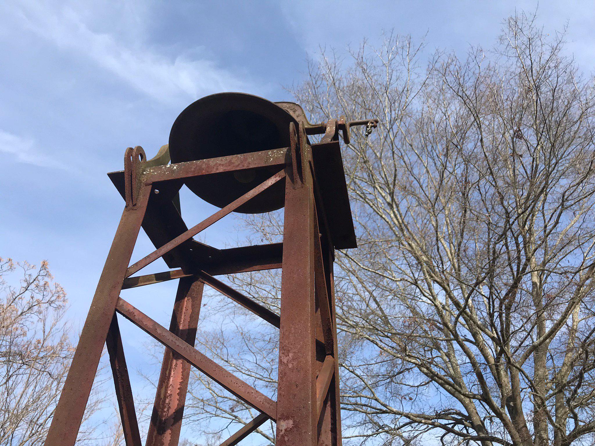 Antique Cast Iron Bell on Steel Tower