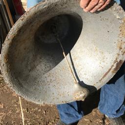 1886 Cast Iron Bell with Cradle. (Measures 15” tall x 18” wide)