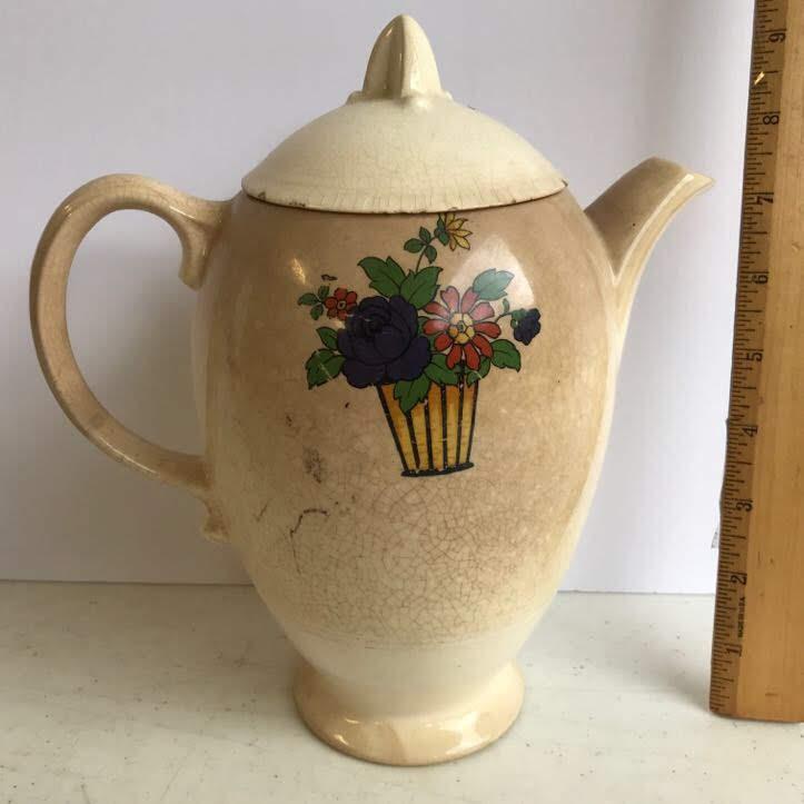 Antique Pottery Pitcher with Floral Appliqué Design
