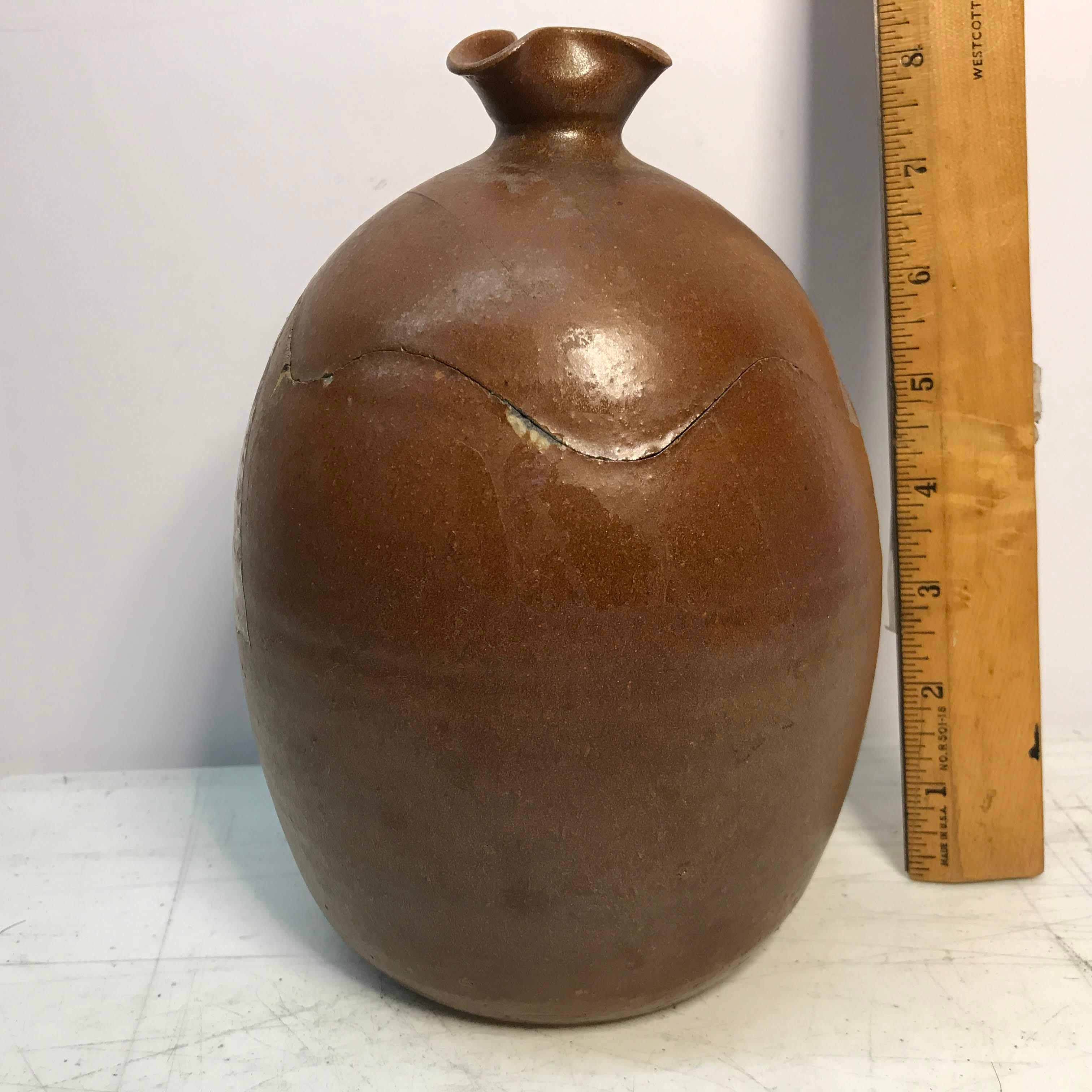 Unique Egg Shaped Pottery Jar with Ruffled Edge Lid