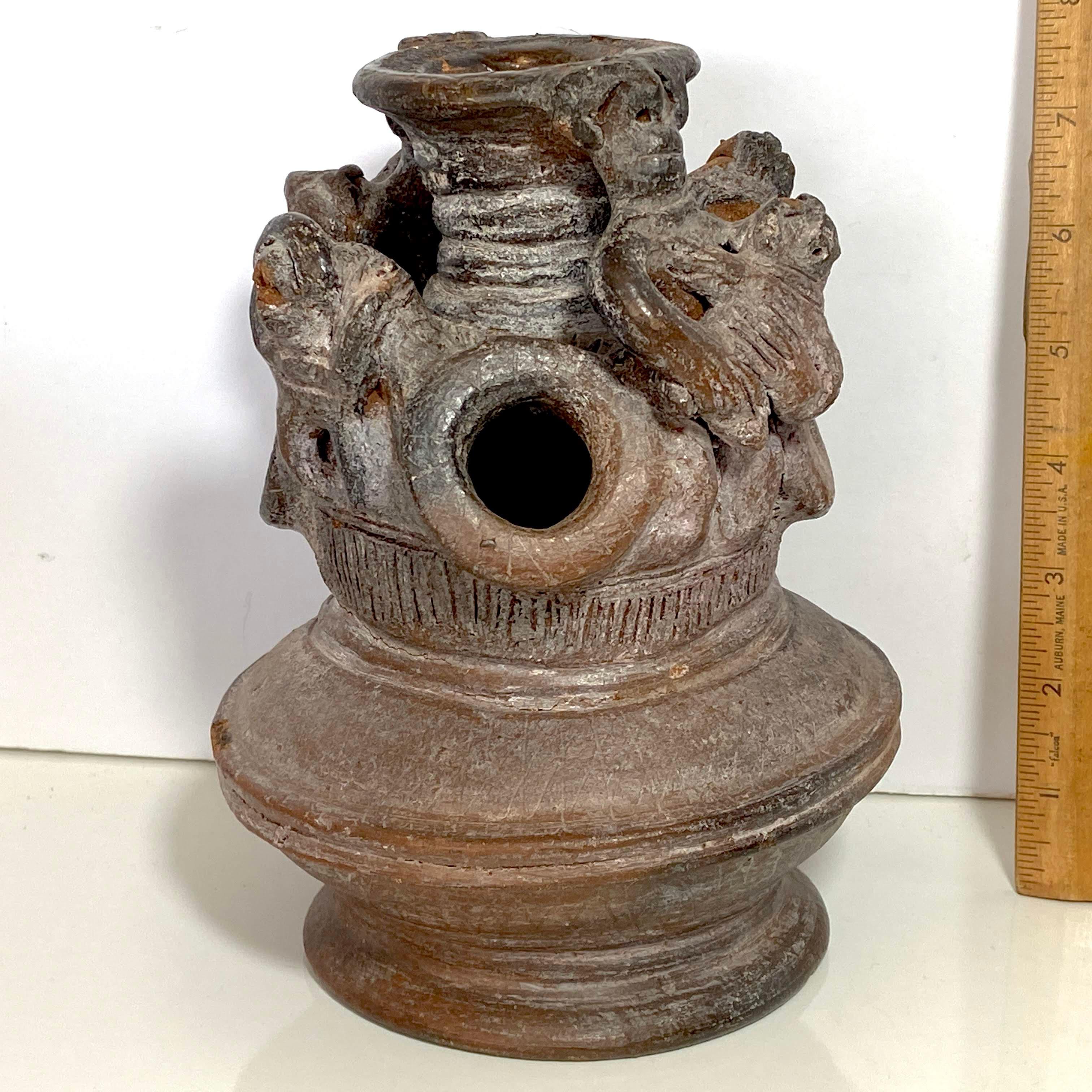 Early Pottery Vessel with Multiple Holes & Hand Carved Figures