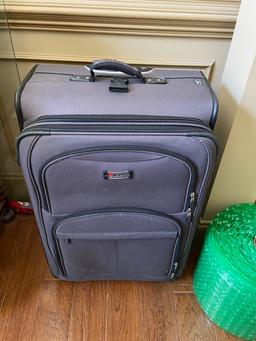 Pair of Large Rolling Suitcases