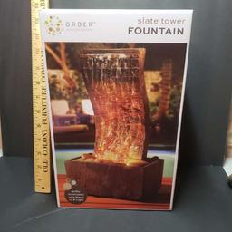 New in Box Curvy Slate Tower Fountain, Warm LED Lights, Battery Operated