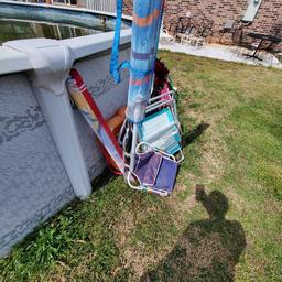 Lot of Outdoor Chairs and Beach Umbrella