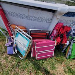 Lot of Outdoor Chairs and Beach Umbrella