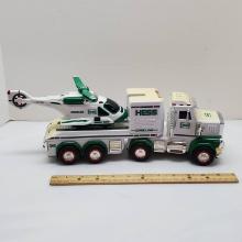 Battery Operated Toy Hess Truck Copyright 2013 and Toy Hess Helicopter Copyright 2006