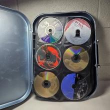 Hard Shell Case Filled with 179 Assorted CD’s