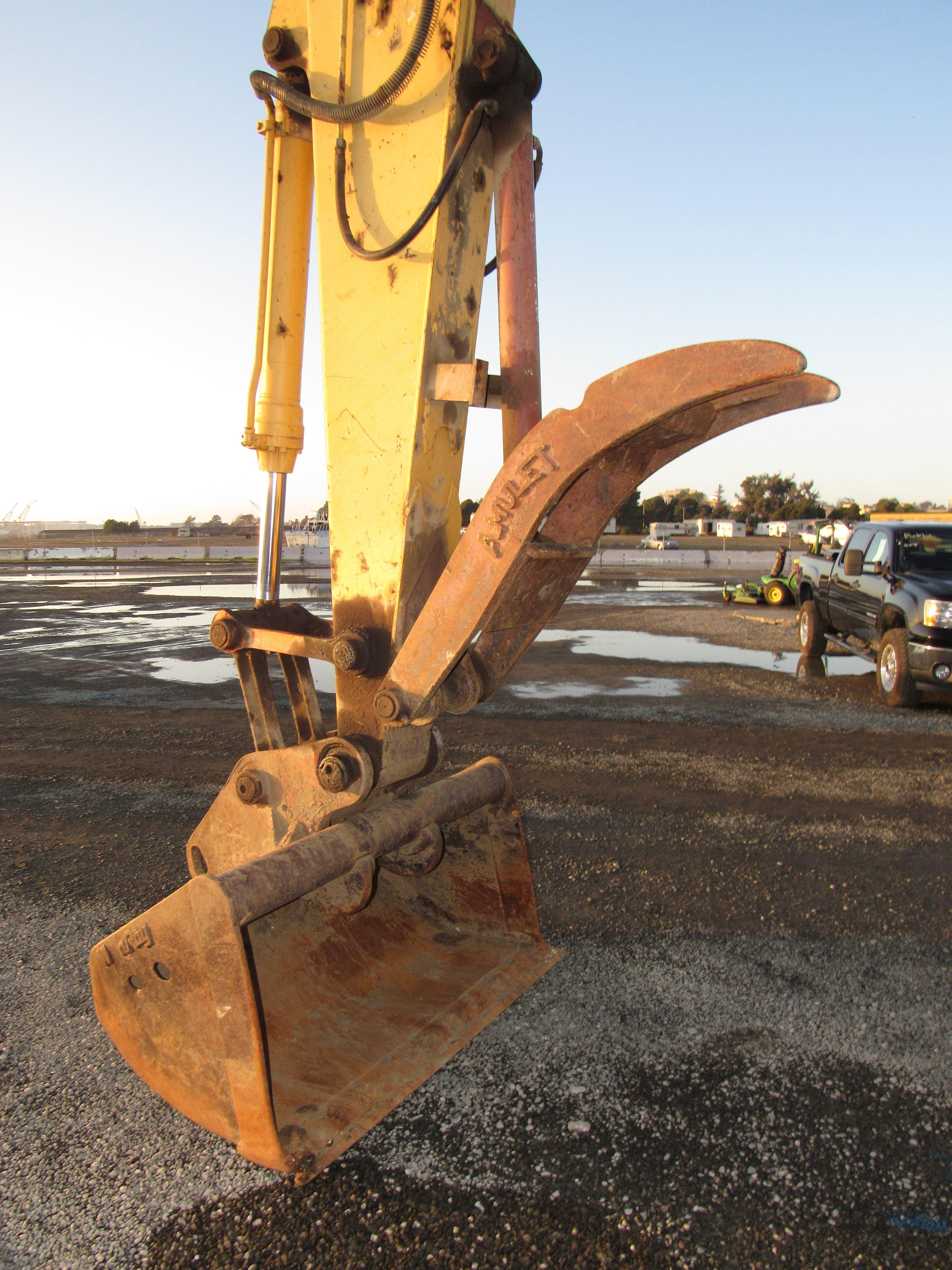 1995 JOHN DEERE 595D WHEELED EXCAVATOR (NON COMPLIANT)