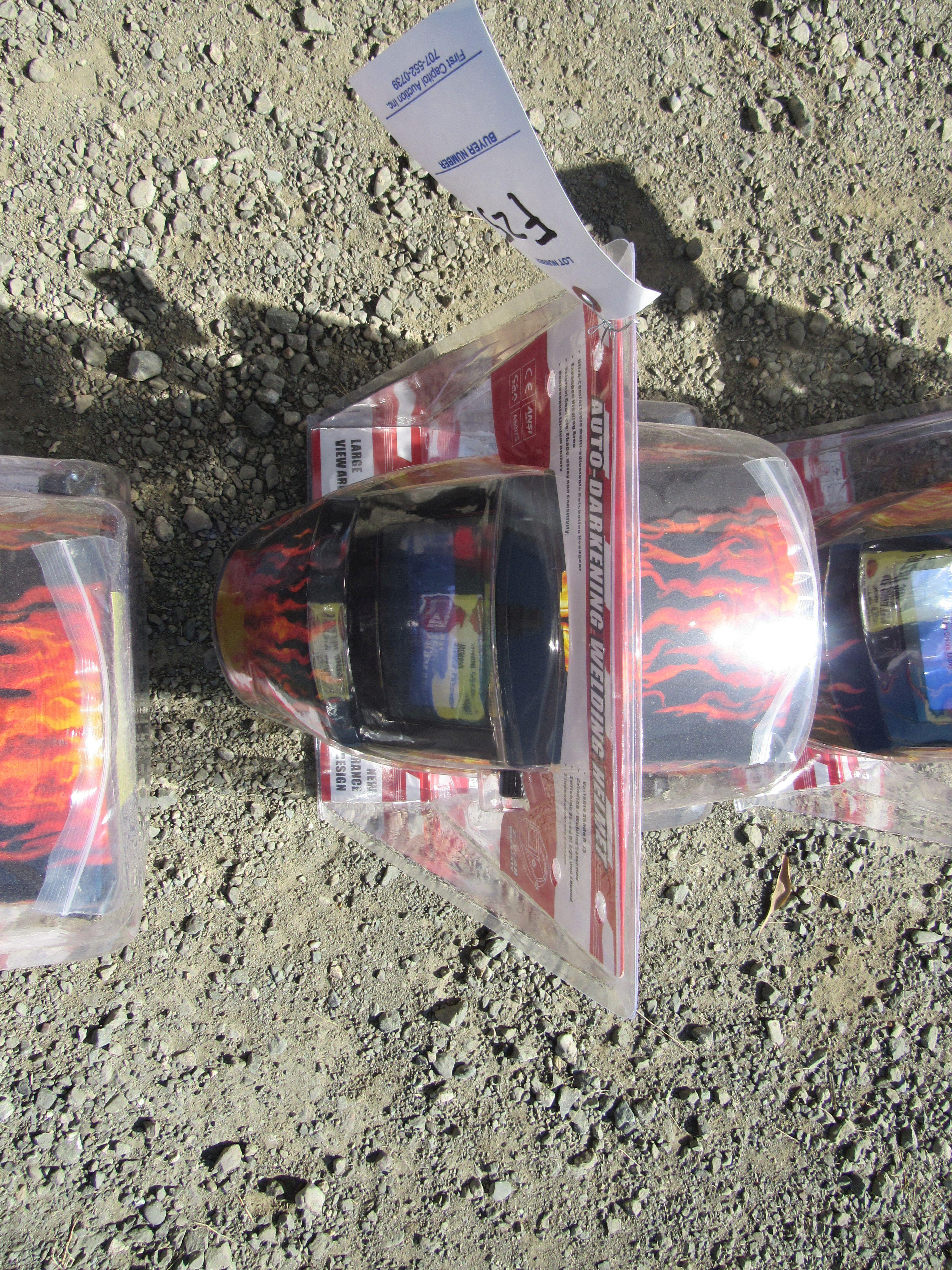 NEW & UNUSED AUTO DARKENING WELDING HELMET