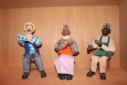 Cigar roller figurines