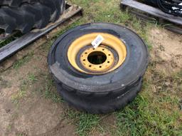 (104)ABSOLUTE - (1)12-16.5 NHS TIRE/RIM