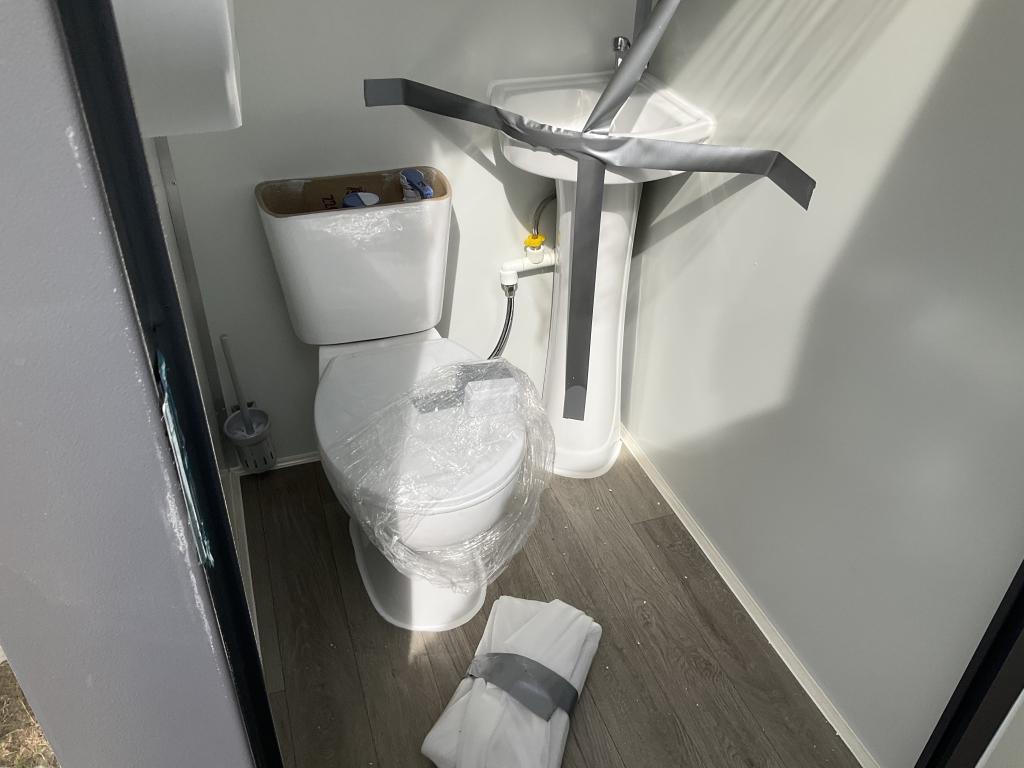 (132)PORTABLE TWO STALL TOILET