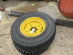 (442) - (2)15" JOHN DEERE TIRES/RIMS - FOAM FILLED