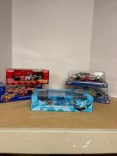 5 Die cast cars in original boxes appear unopened