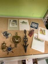 Mixed lot Japanese books brass door knockers and compass seal on marble