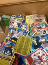 box of sports cards stickers unopened packs