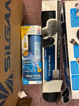 rv sewer hoses, and kit. RV water filter and electrical adapter