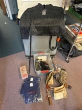 hunting gear, leopard print shirt, scrubs, gun cleaning kits, knives, cane etc.